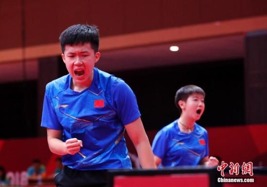 資料圖：雅加達(dá)亞運(yùn)會(huì)，王楚欽/孫穎莎奪得混雙冠軍。 <a target='_blank' href='/'>中新社</a>記者 劉關(guān)關(guān) 攝